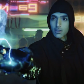 Gamer in a hoodie playing League of Legends