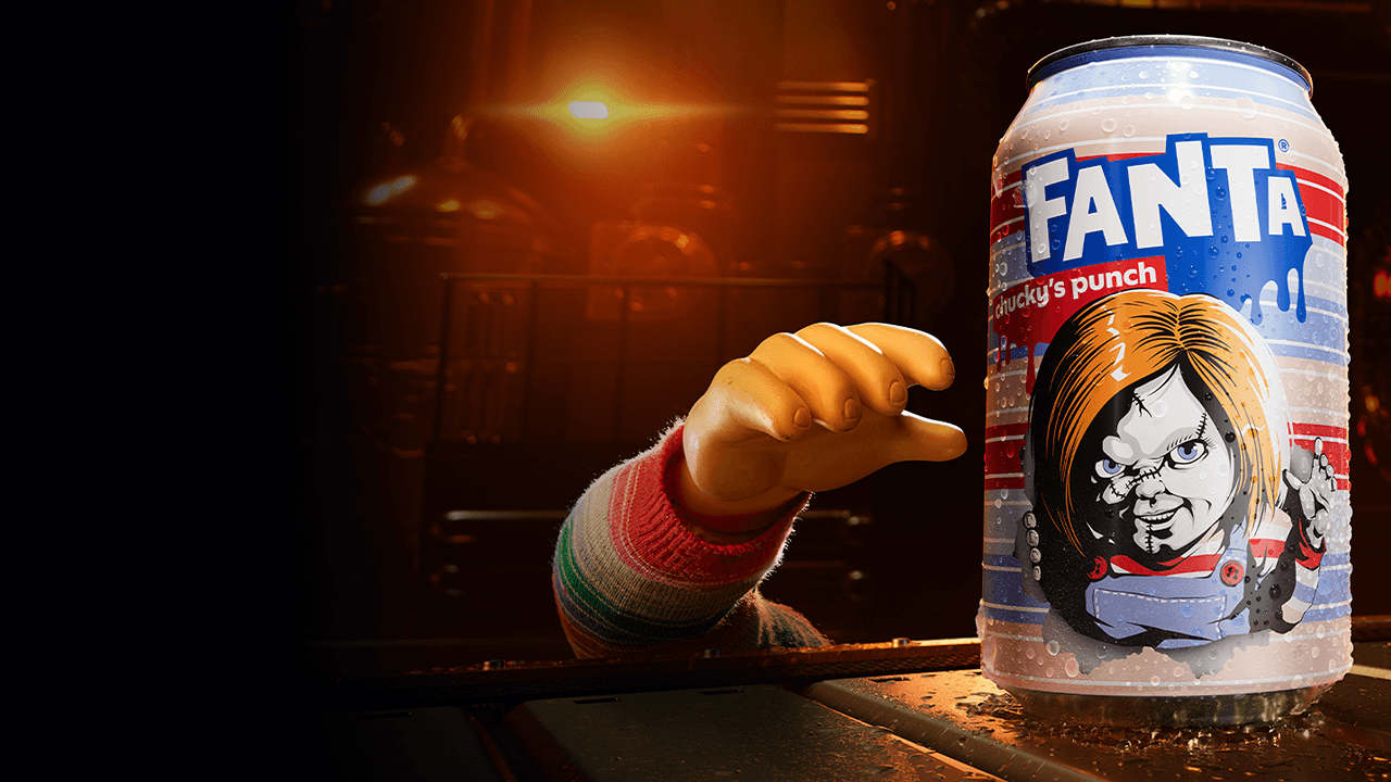 The hand of chucky from child's play reaching for the new chucky flavoured fanta can
