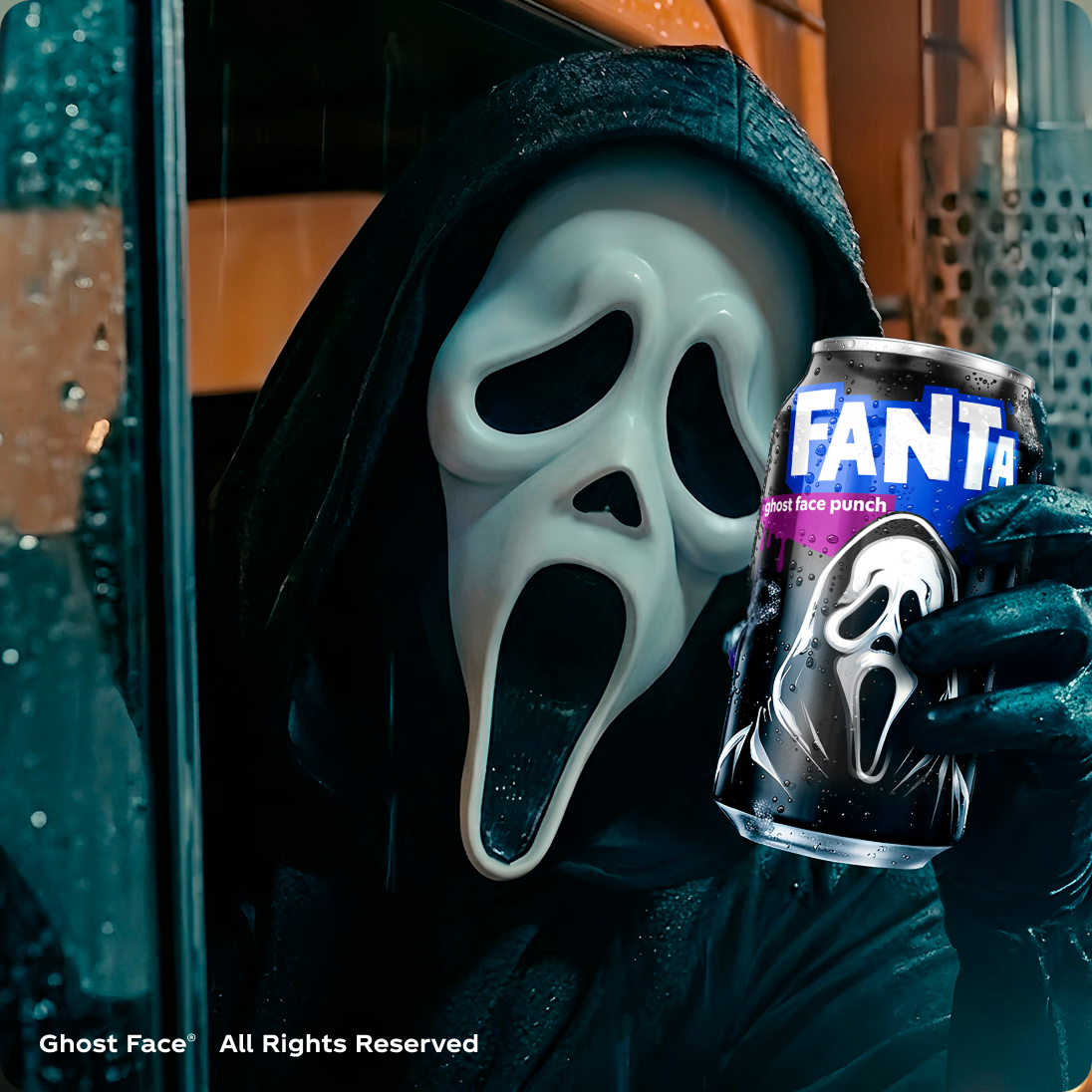 Ghost Face character lurking holding a Ghost Face Fanta can