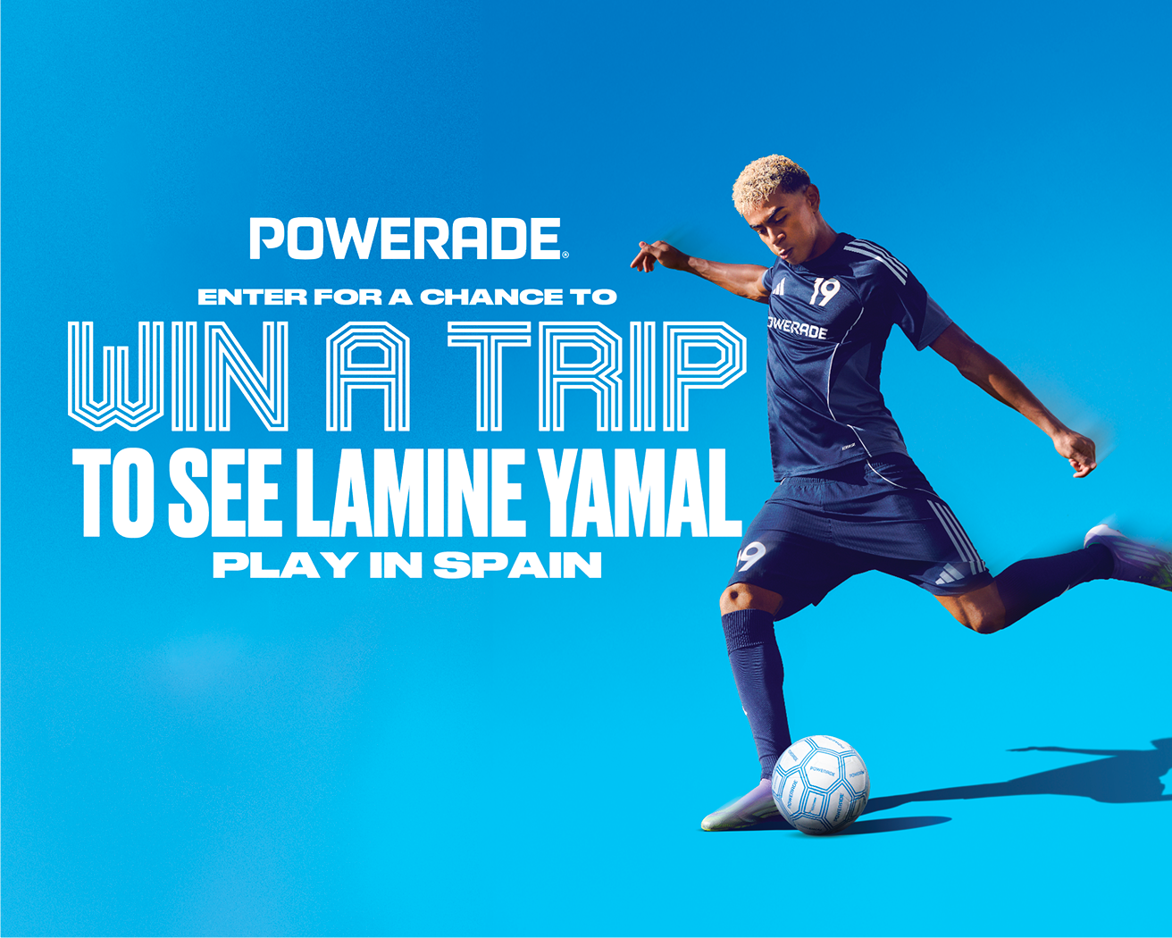 Powerade FIFA sweepstakes banner showing soccer player in navy kit kicking ball with bold headline about winning a trip to Spain.