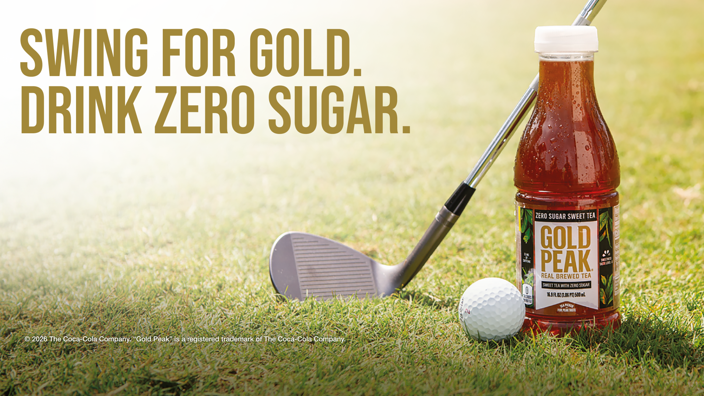 Gold Peak Zero Sugar tea bottle on golf fairway beside club and ball, promoting Swing for Gold PGA Kroger sweepstakes banner.