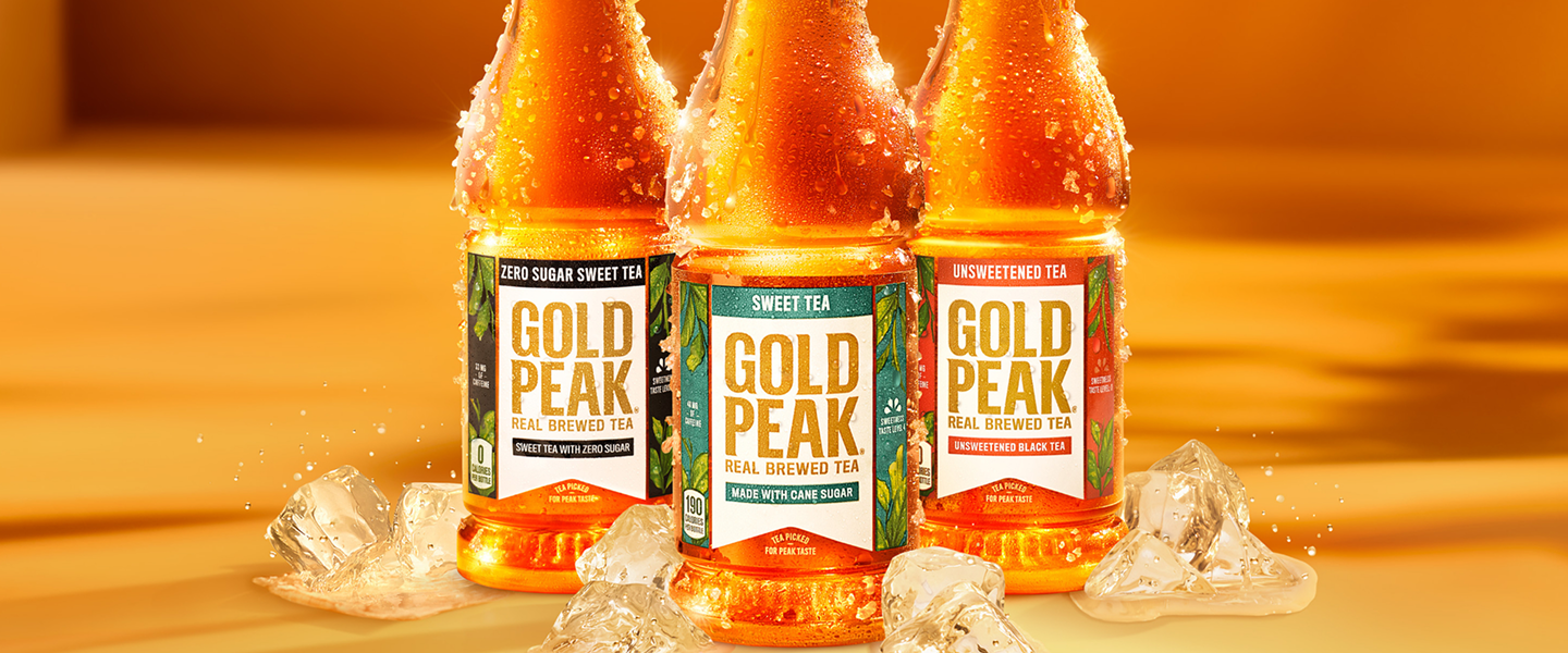 three gold peak bottles