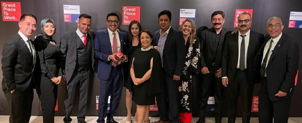 Coca-Cola Middle East representatives receiving the Great Place to Work award