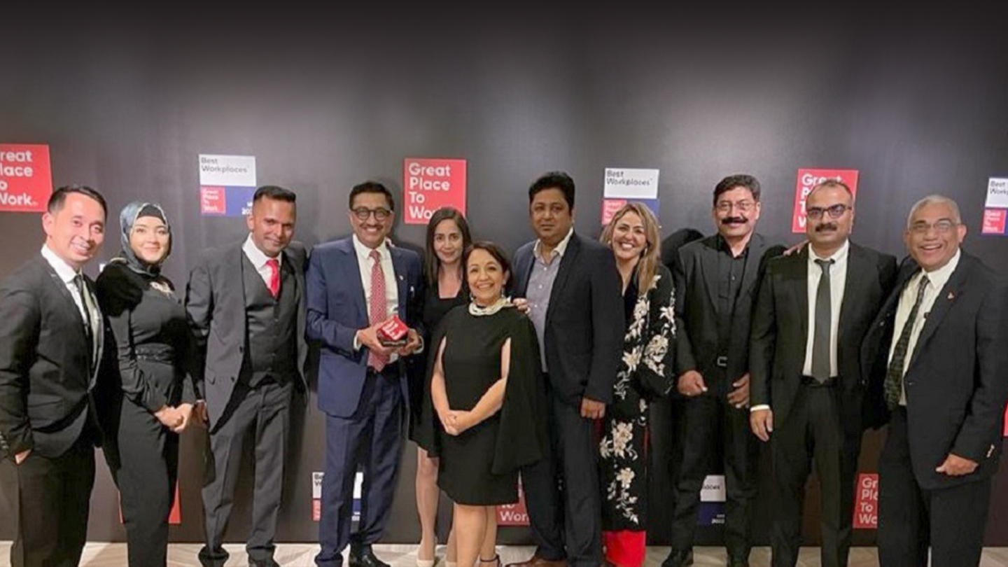 Coca-Cola Middle East representatives receiving the Great Place to Work award
